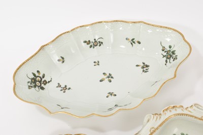 Lot 57 - A Worcester plate, circa 1770, decorated with the Horner of Mells pattern, in the atelier of Giles, together with three other similar pieces, including a oval basketweave di...