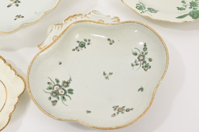 Lot 57 - A Worcester plate, circa 1770, decorated with the Horner of Mells pattern, in the atelier of Giles, together with three other similar pieces, including a oval basketweave di...