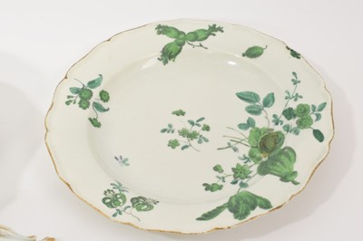 Lot 57 - A Worcester plate, circa 1770, decorated with the Horner of Mells pattern, in the atelier of Giles, together with three other similar pieces, including a oval basketweave di...