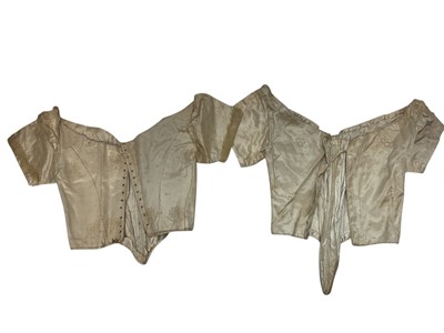 Lot 2056 - Box containing two Victorian embroidered net lace wedding bodices pointed at waistline, Mechlin lace fichu, one other lace fichu and a Honiton lace collar.