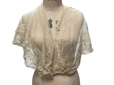 Lot 2056 - Box containing two Victorian embroidered net lace wedding bodices pointed at waistline, Mechlin lace fichu, one other lace fichu and a Honiton lace collar.