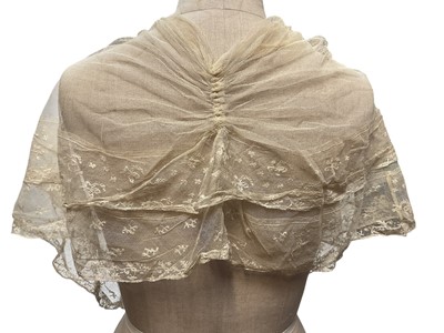 Lot 2056 - Box containing two Victorian embroidered net lace wedding bodices pointed at waistline, Mechlin lace fichu, one other lace fichu and a Honiton lace collar.