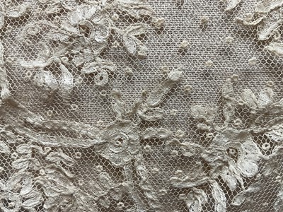 Lot 2056 - Box containing two Victorian embroidered net lace wedding bodices pointed at waistline, Mechlin lace fichu, one other lace fichu and a Honiton lace collar.