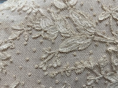 Lot 2056 - Box containing two Victorian embroidered net lace wedding bodices pointed at waistline, Mechlin lace fichu, one other lace fichu and a Honiton lace collar.
