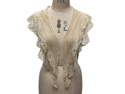 Lot 2056 - Box containing two Victorian embroidered net lace wedding bodices pointed at waistline, Mechlin lace fichu, one other lace fichu and a Honiton lace collar.