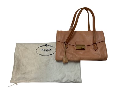 Lot 2079 - Two Prada handbags, pink canvas bag and apricot leather with pink leather lining bag. Also a black Osprey bag, pink Vera Pelle shoulder bag, silver leather bag by Dollargrand, Lulu Guiness Wild...