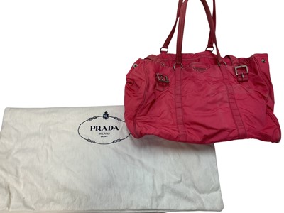 Lot 2079 - Two Prada handbags, pink canvas bag and apricot leather with pink leather lining bag. Also a black Osprey bag, pink Vera Pelle shoulder bag, silver leather bag by Dollargrand, Lulu Guiness Wild...