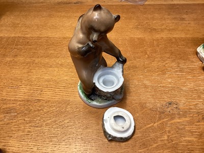 Lot 1181 - Two Russian Lomonosov LFZ figural bear inkwells, together with another bear mother with cradle (3)