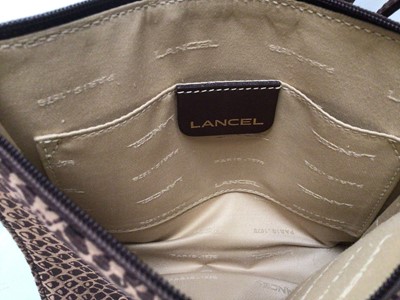 Lot 2102 - Lancel faux snake skin textile small handbag with soft dust bag.