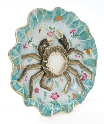 Lot 60 - 18th century Qianlong Period Chinese export porcelain Mancerina (cup stand) with a moulded crab in relief on a turquoise edged lotus leaf decorated with seaweed and flowers raised on a circular...