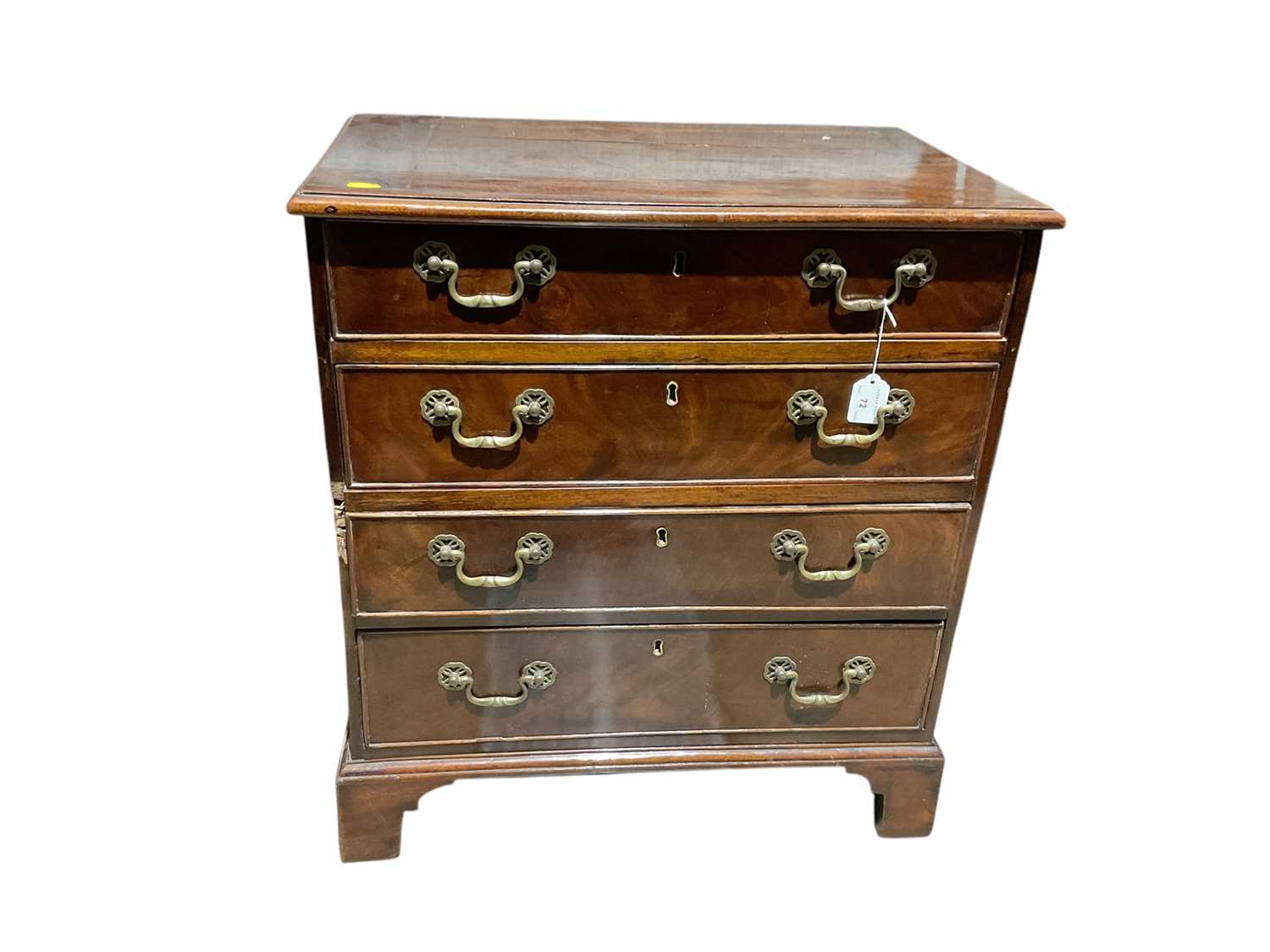 Lot 72 - Georgian style mahogany small chest of four graduated drawers on bracket feet, 63cm wide x 41cm deep x 70cm high