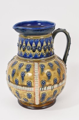 Lot 88 - Victorian Doulton baluster vase, probably by George Tinworth, and two similar Doulton jugs