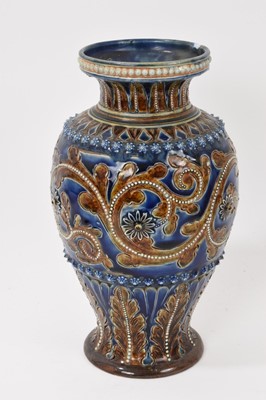 Lot 88 - Victorian Doulton baluster vase, probably by George Tinworth, and two similar Doulton jugs