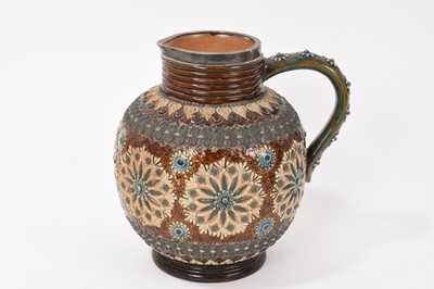 Lot 88 - Victorian Doulton baluster vase, probably by George Tinworth, and two similar Doulton jugs