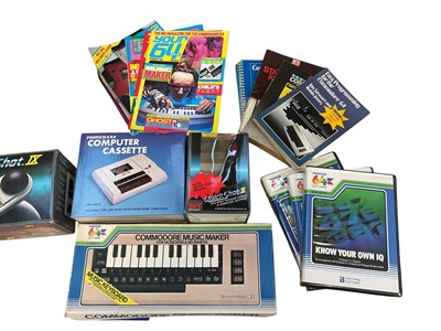 Lot 1996 - Vintage Commode 64 Micro Computer with Music Keyboard, Joysticks, Cassette, Games & Manuals (1 box)