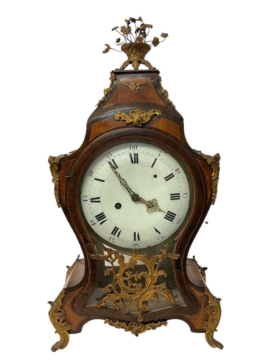 Lot 735 - 18th century French provincial bracket clock of shaped form, the case with ormolu decoration and mounts