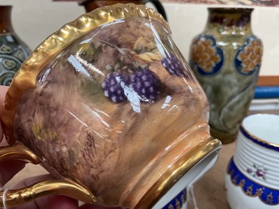 Lot 101 - Pair of Royal Worcester cabinet cups and saucers, dated 1954/55, painted with fruit, signed P. Love, the saucers 15cm diameter