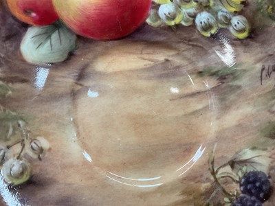 Lot 101 - Pair of Royal Worcester cabinet cups and saucers, dated 1954/55, painted with fruit, signed P. Love, the saucers 15cm diameter
