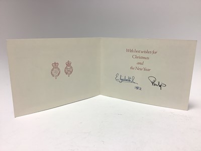 Lot 73 - H.M. Queen Elizabeth II and H.R.H. The Duke of Edinburgh, signed 1982 Christmas card with gilt embossed Royal cyphers to the interior, photograph to the cover of The Queen, Prince Philip and Pri...