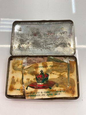 Lot 378 - A commemorative chocolate tin for the Coronation of King Edward VII & Queen Alexandra, 26th June 1902, still contains the original uneaten Cadbury's chocolate.