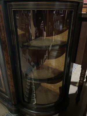 Lot 90 - 19th century ebonised and amboyna credenza with bow glass ends and central cupboard door decorated with inlay