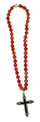 Lot 500 - 19th century banded agate cross pendant in a gold mount set with seed pearls to the terminals suspended from an antique coral/jasper bead necklace