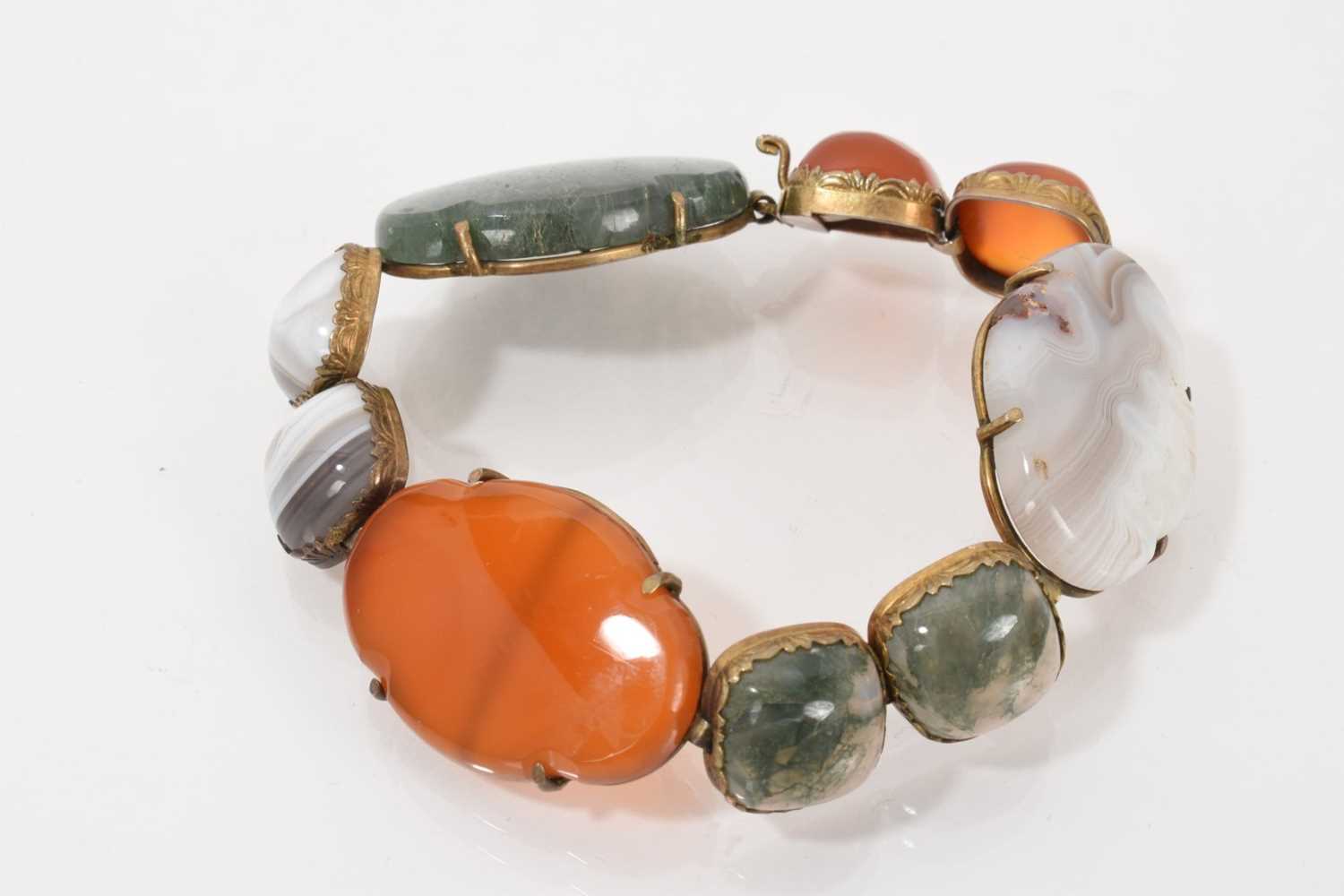 Lot 502 - 19th century hardstone and agate panel bracelet in silver gilt setting, 18cm long