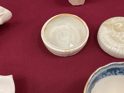 Lot 71 - Group of Chinese porcelain, including an early celadon pot and cover, blanc de chine libation cups, etc