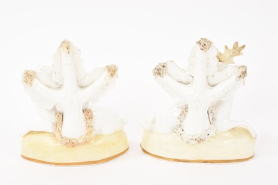 Lot 102 - Pair of Samuel Alcock porcelain figures of a doe and stag, circa 1830, sparsely decorated, shown seated on gilt-lined bases, 11.5cm high