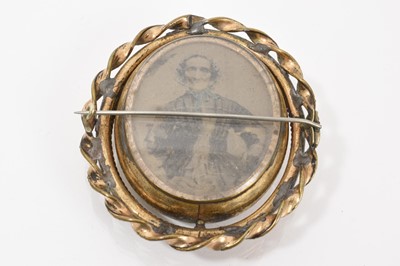 Lot 522 - 19th century Italian carved shell cameo depicting Hebe, Greek goddess of youth feeding an eagle, in a gilt metal revolving brooch mount with glazed portrait to the reverse