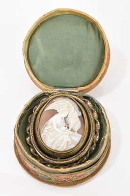 Lot 522 - 19th century Italian carved shell cameo depicting Hebe, Greek goddess of youth feeding an eagle, in a gilt metal revolving brooch mount with glazed portrait to the reverse