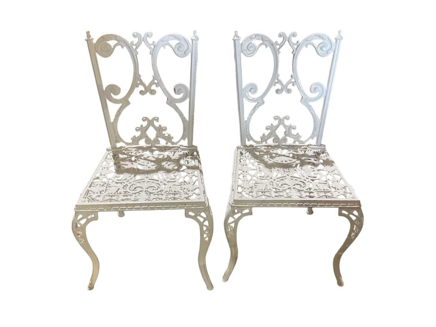Lot 61 - Metal garden table together with four chairs