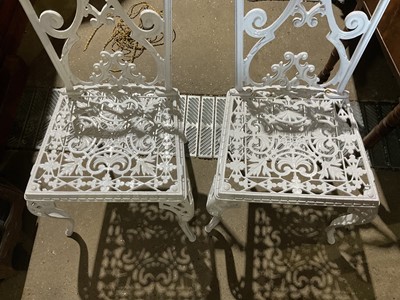 Lot 61 - Metal garden table together with four chairs