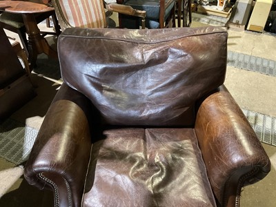 Lot 81 - Brown leather armchair with studded decoration