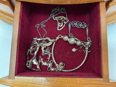 Lot 111 - Wooden jewellery box containing silver and white metal jewellery including gem set pendants and rings, earrings, green hard stone bead necklaces etc