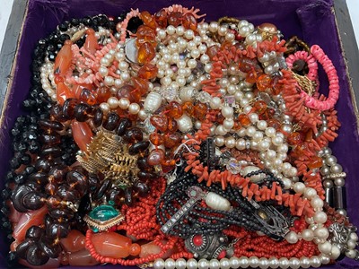 Lot 112 - Jewellery box containing vintage bead necklaces including amber, coral etc, 1920s 9ct gold cased wristwatch on plated bracelet