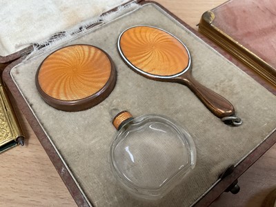 Lot 247 - Miniature enamelled dressing table set, cased, onyx snuff box, Chinese mirror, other vertu items