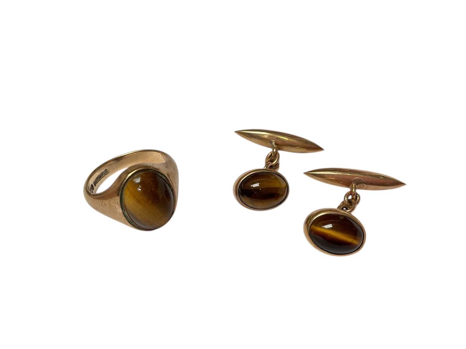 Lot 1 - 1960s 9ct gold tiger's eye ring and pair of 9ct gold mounted tiger's eye cufflinks