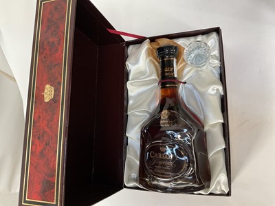 Lot 28 - Eight bottles including, three Bell's Christmas decanters, Carlos I Imperial, V.S.O.P Gaston de Lagrange Cognac, Ouzo and other bottles (8)