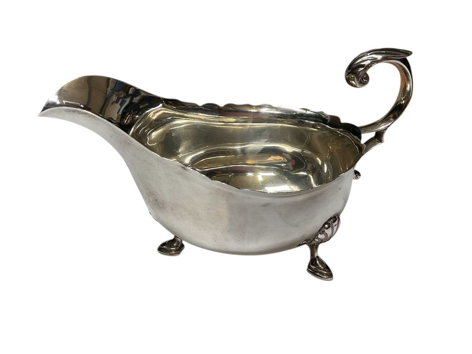 Lot 22 - 1930s silver sauce boat retailed by Harrods (Sheffield 1939)