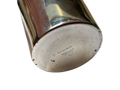 Lot 117 - Tiffany & Co silver beaker with engraved initials G.M.O.B (London 1992), 7.6cm high x 6.6cm rim diameter