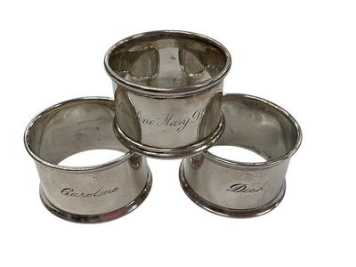 Lot 140 - Group of seven silver napkin rings, including one engraved 'Dick', (various dates and makers), all at approximately 5ozs (7).