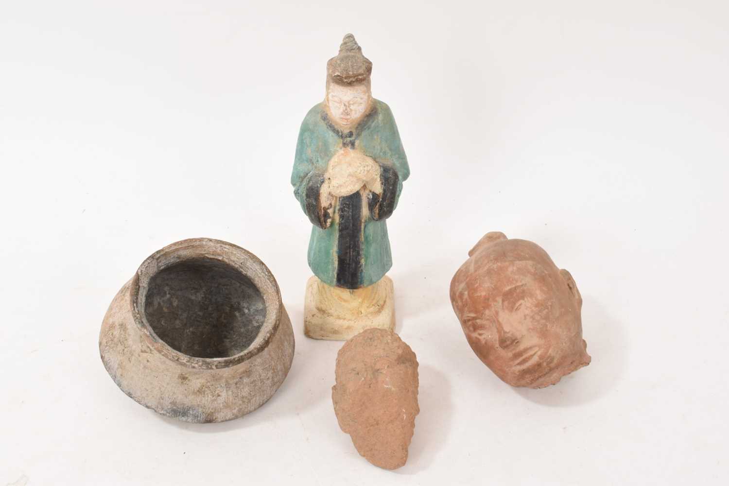 Lot 680 - Chinese tomb figure, two head fragments and bowl