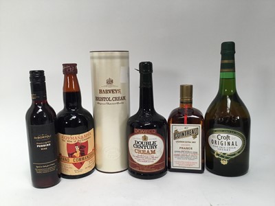 Lot 94 - Sixteen bottles, mixed to include liquors, port, Smirnoff vodka, sherry and others