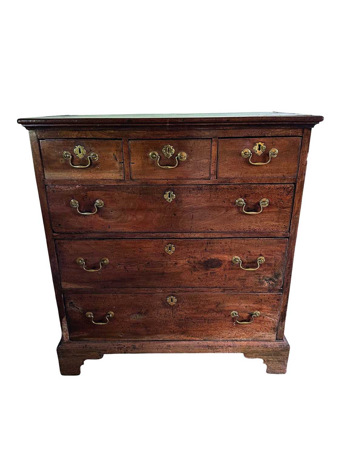 Lot 1250 - 18th century East Anglian fruitwood chest of three short and three long drawers (losses)