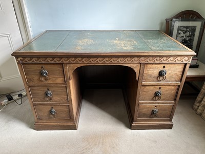 Lot 1259 - Late 19th century mahogany twin pedestal desk, the green leather lined top above an arrangement of six drawers with brass lion mask ring handles
