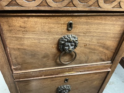 Lot 1259 - Late 19th century mahogany twin pedestal desk, the green leather lined top above an arrangement of six drawers with brass lion mask ring handles