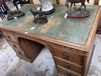 Lot 1259 - Late 19th century mahogany twin pedestal desk, the green leather lined top above an arrangement of six drawers with brass lion mask ring handles