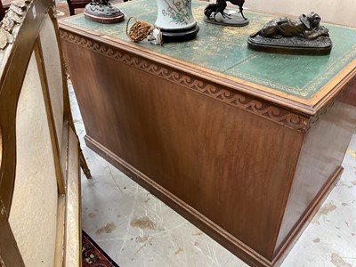 Lot 1259 - Late 19th century mahogany twin pedestal desk, the green leather lined top above an arrangement of six drawers with brass lion mask ring handles
