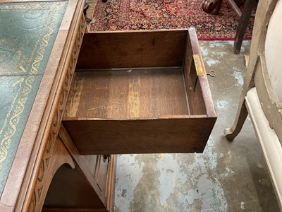 Lot 1259 - Late 19th century mahogany twin pedestal desk, the green leather lined top above an arrangement of six drawers with brass lion mask ring handles